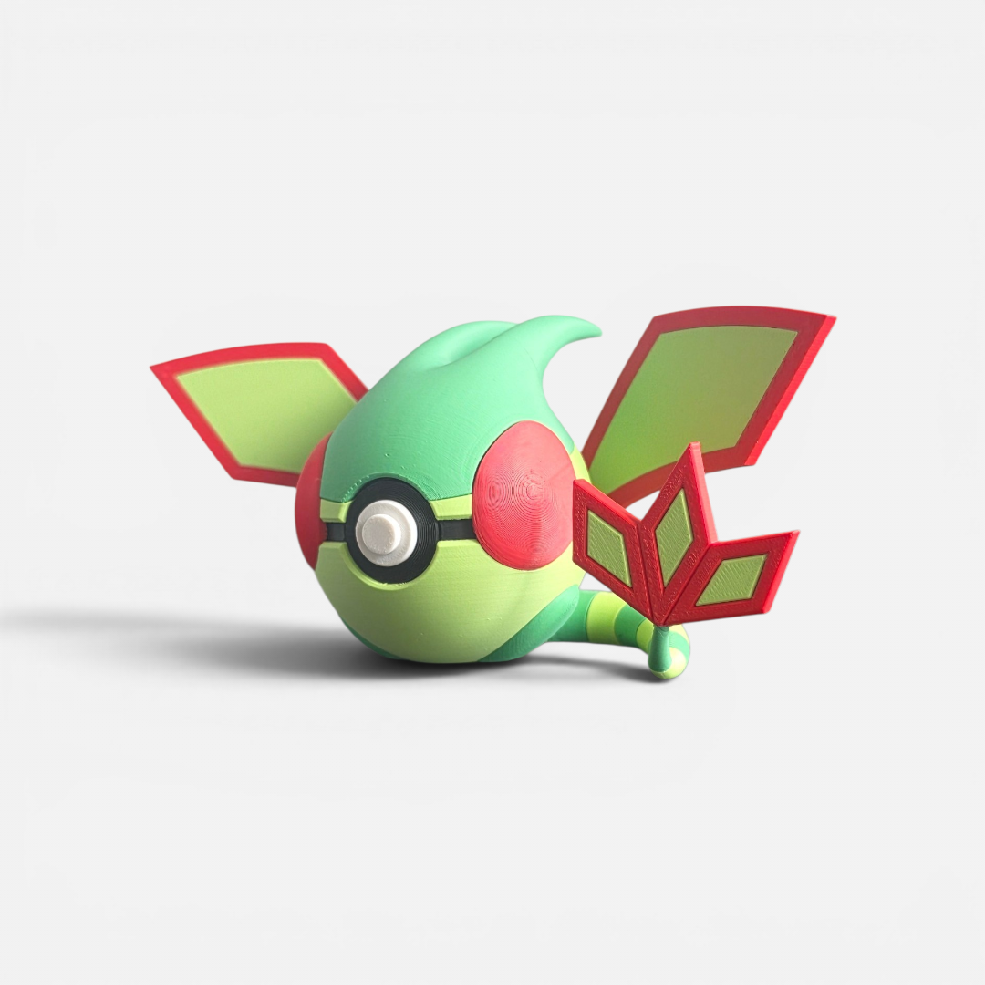 Close up of the creature ball showing red-trimmed rhombus wing detail and green body
