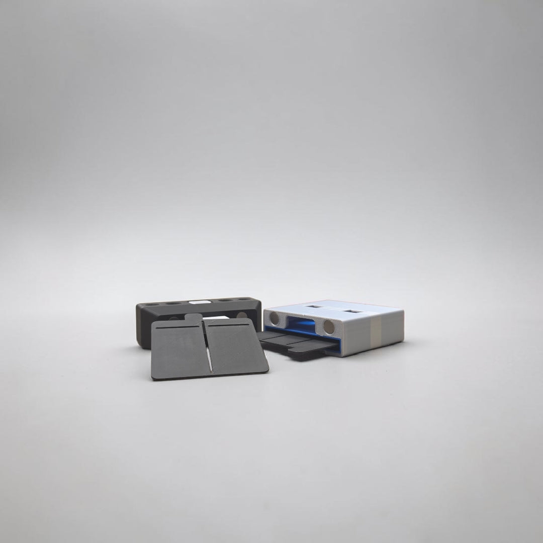 Close up of the USB note holder showing magnetic closure and button mechanism