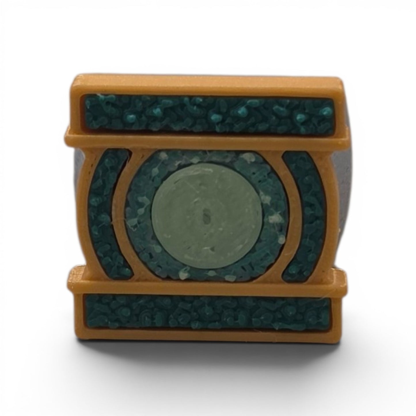 3D printed gold and teal power ring front face view showing full square face design