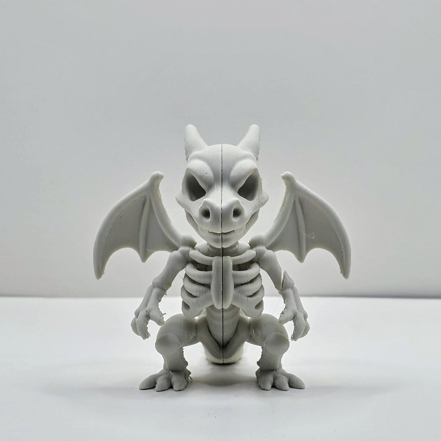 Skeletal Winged Dragon-Inspired Figure – Bone Detail Collectible
