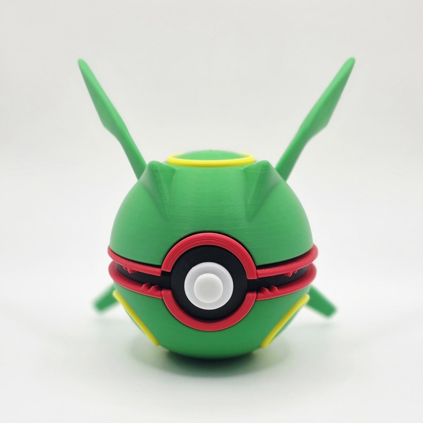 3D printed emerald sky serpent dragon creature ball with jagged wing detail