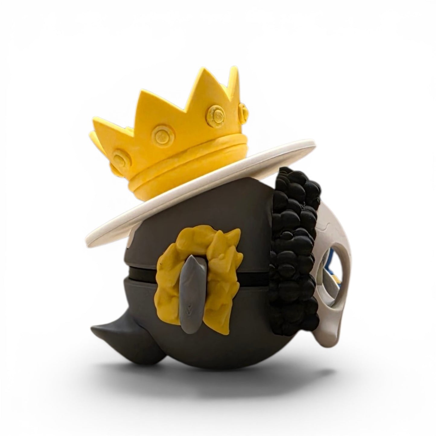Close up of the mashup creature ball showing full front view with skull and crown hat detail