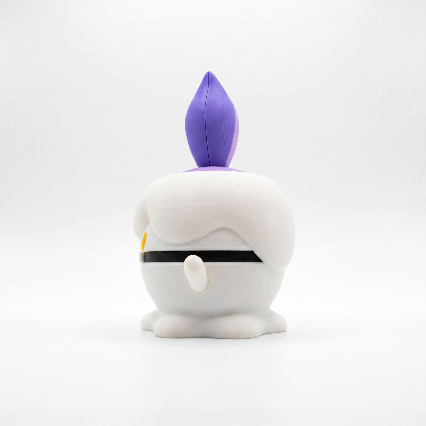 Close up of the creature ball showing single yellow eye and full ghost candle silhouette profile