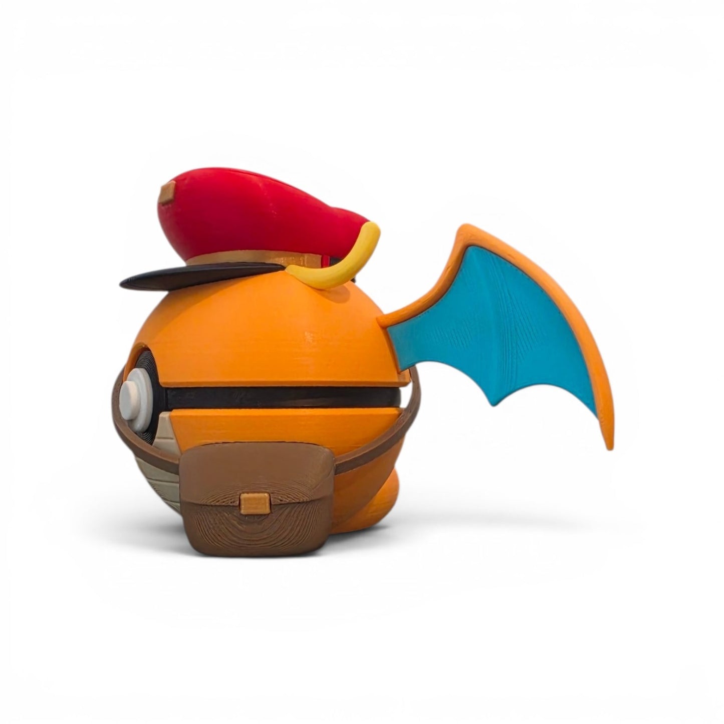 Close up of the creature ball showing cream striped belly and orange lower body detail