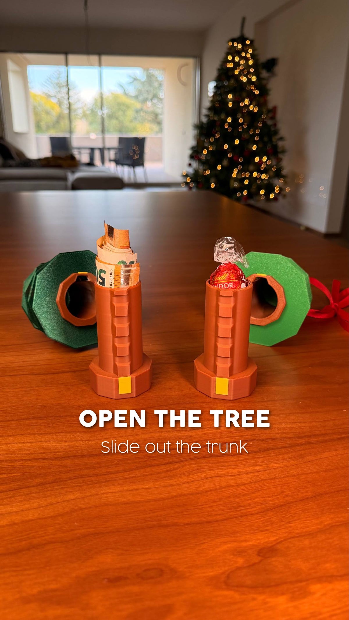 Pine Code Christmas tree cryptex opened showing the hidden chamber inside the trunk