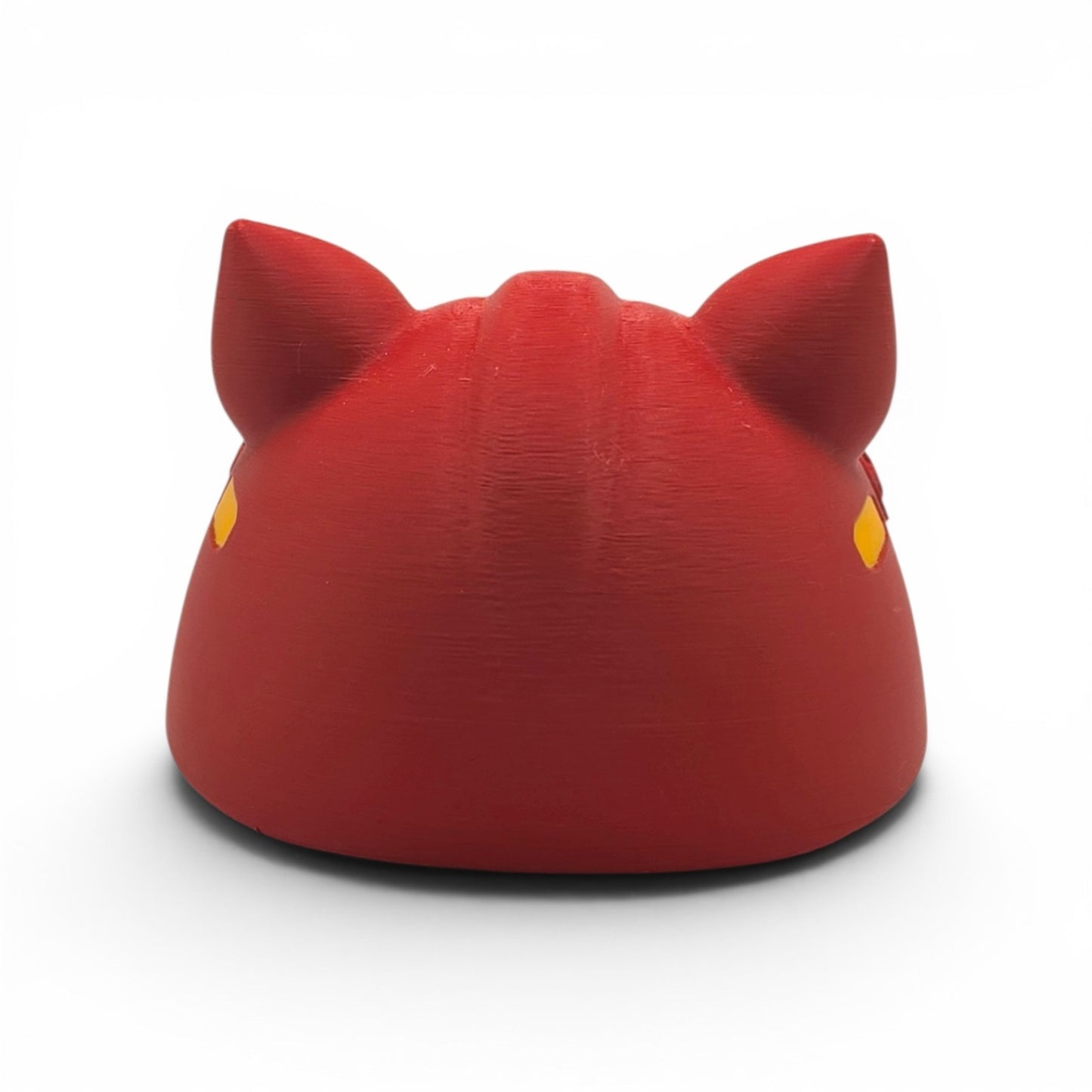Close up of the Battle Cat helmet showing top view with ear sculpt and yellow dot detail