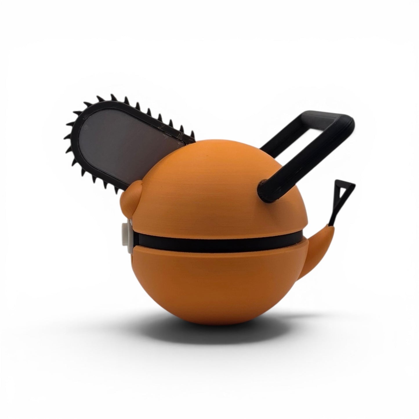 Close up of the creature ball showing orange body and black accent seam detail