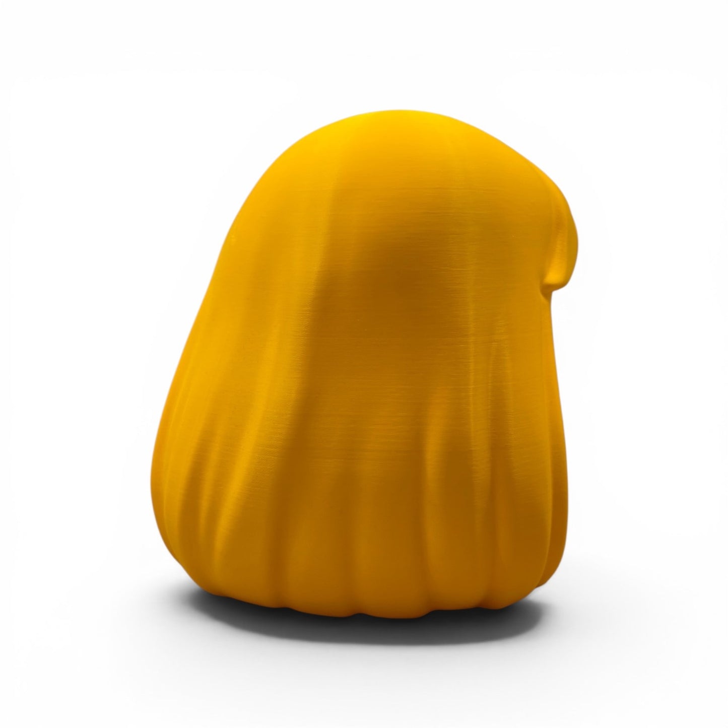 Close up of the cosplay hair helmet showing sweeping side panel and amber gold filament