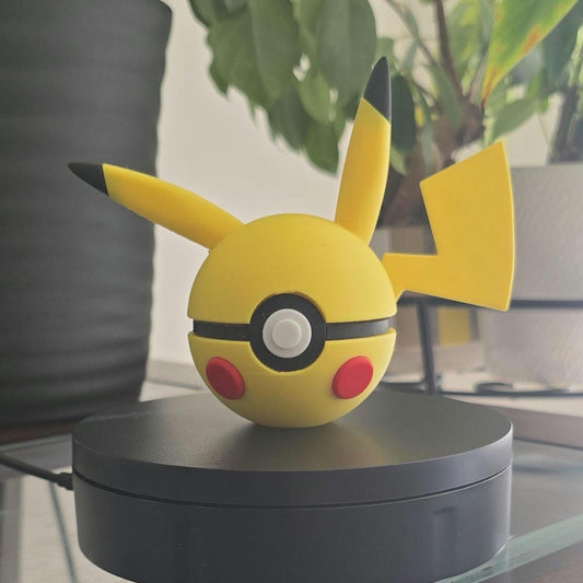 3D printed yellow electric mouse creature ball with jagged lightning tail