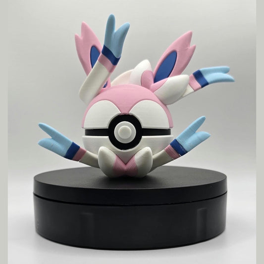 3D printed pastel pink fairy fusion creature ball with sculpted ribbon detail