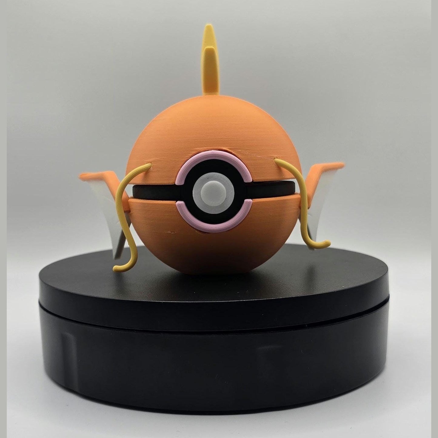 3D printed orange splash crest water fish creature ball with sculpted fins