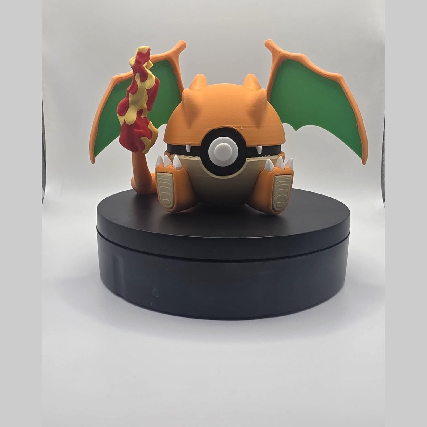 3D printed orange bold flame fire dragon creature ball with yellow accent detail