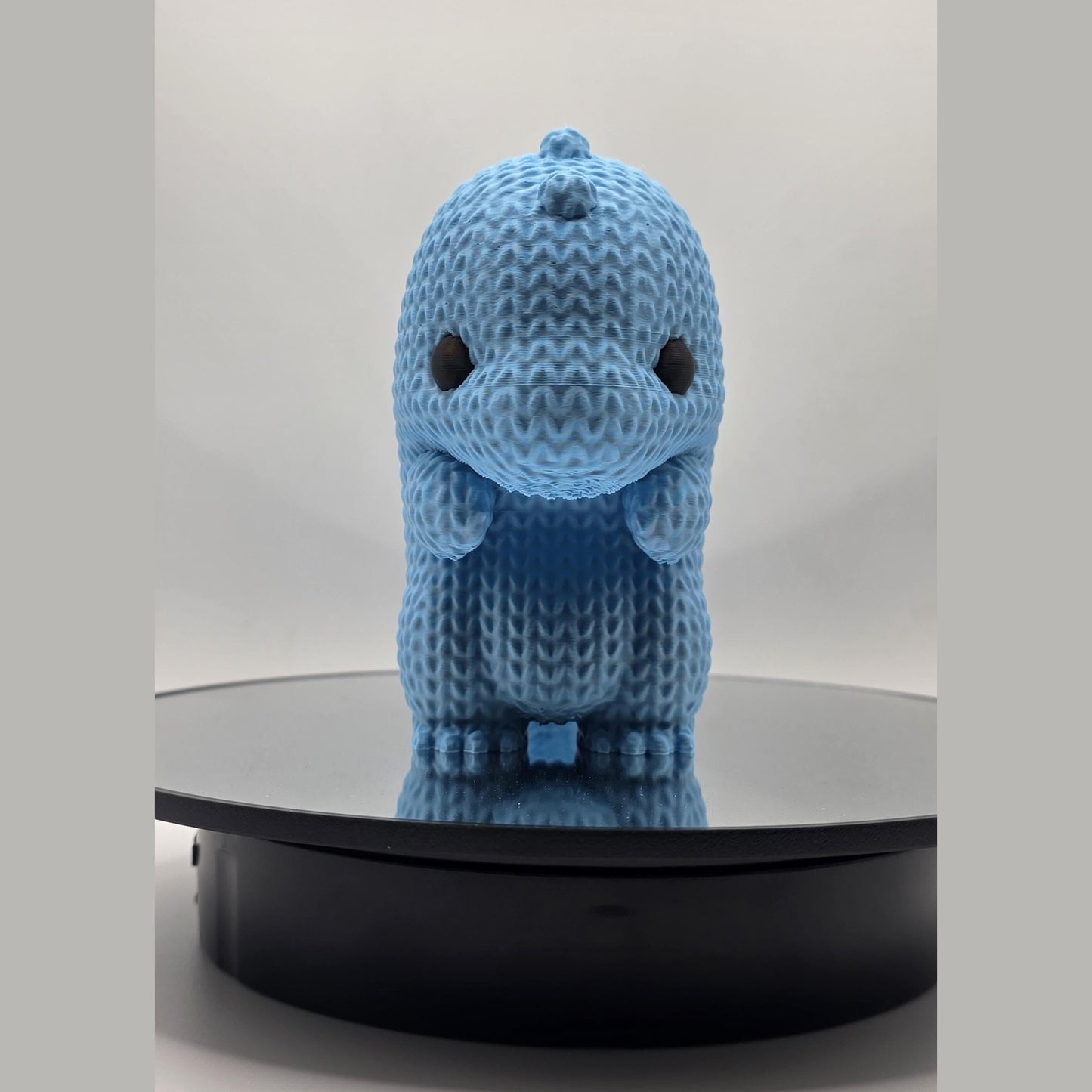 Cuddle-Sized Guardian – Knitted Texture Baby Dragon Figurine