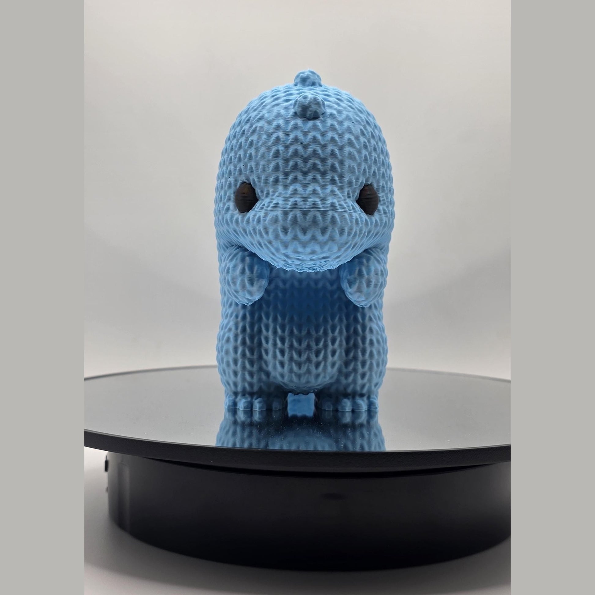 Cuddle-Sized Guardian – Knitted Texture Baby Dragon Figurine
