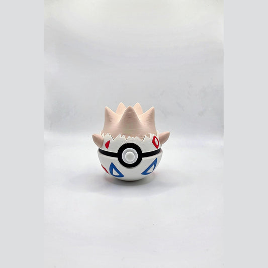 3D printed eggshell baby creature ball with geometric shell pattern accents
