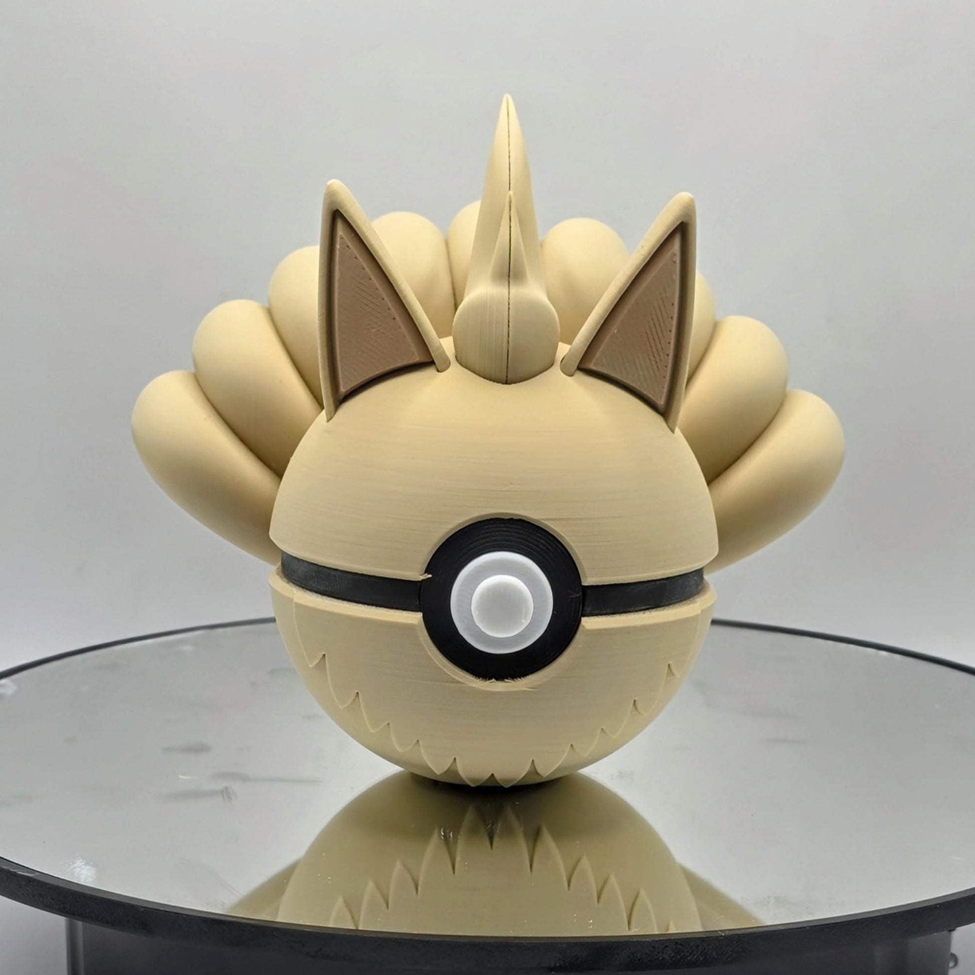 3D printed cream nine tail fox creature ball with sculpted tail array