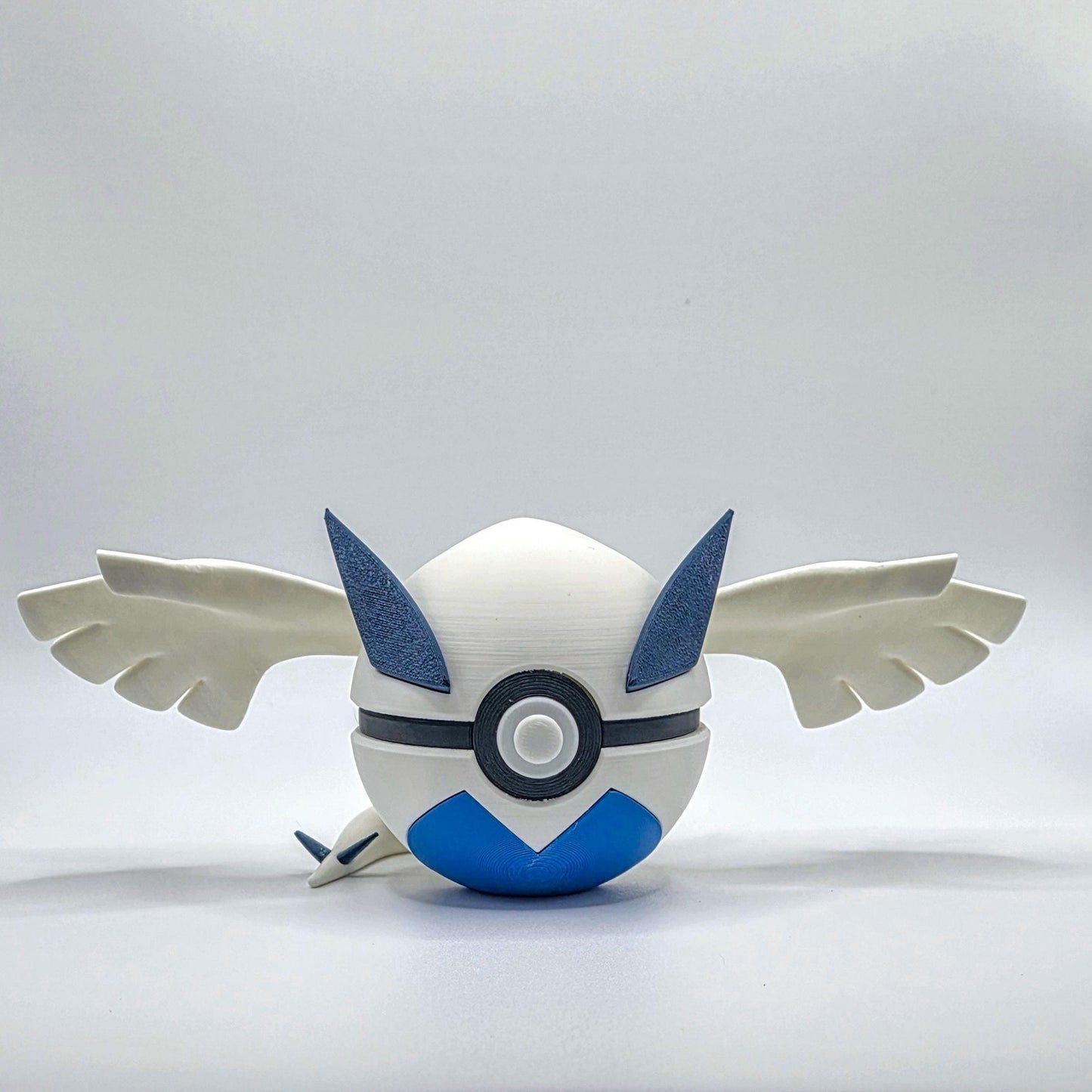 3D printed white and blue majestic sea guardian creature ball with wing extensions
