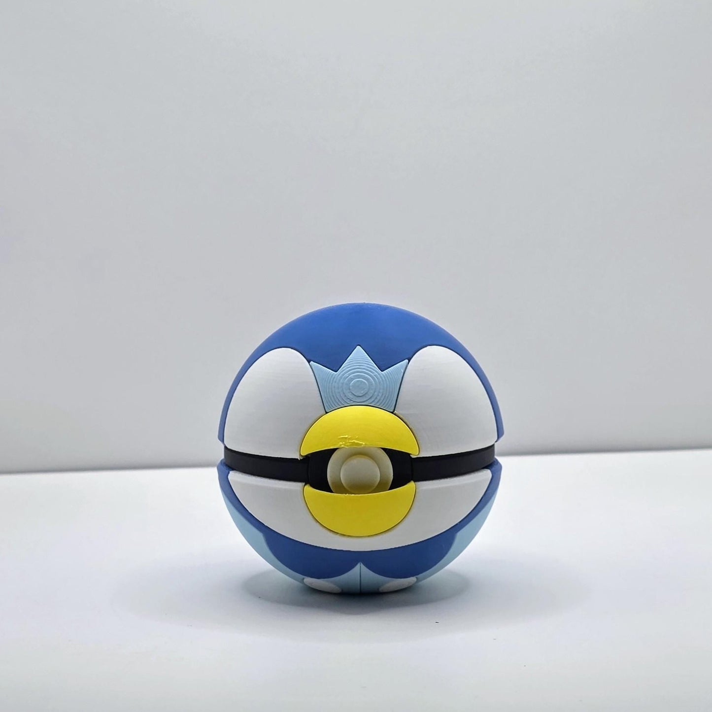 Aqua Crown Collector Ball – Penguin-Inspired Design