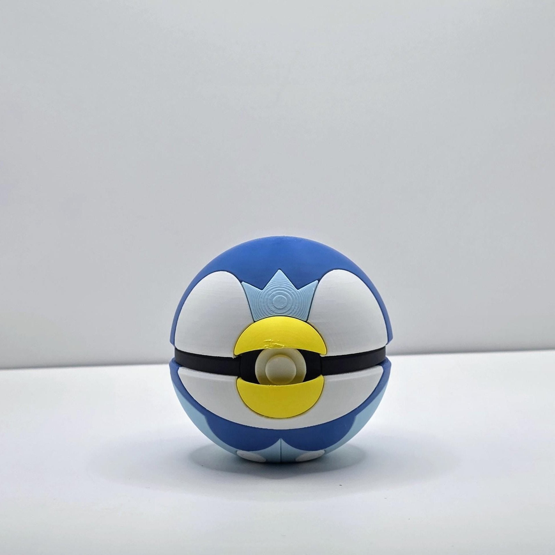 Aqua Crown Collector Ball – Penguin-Inspired Design