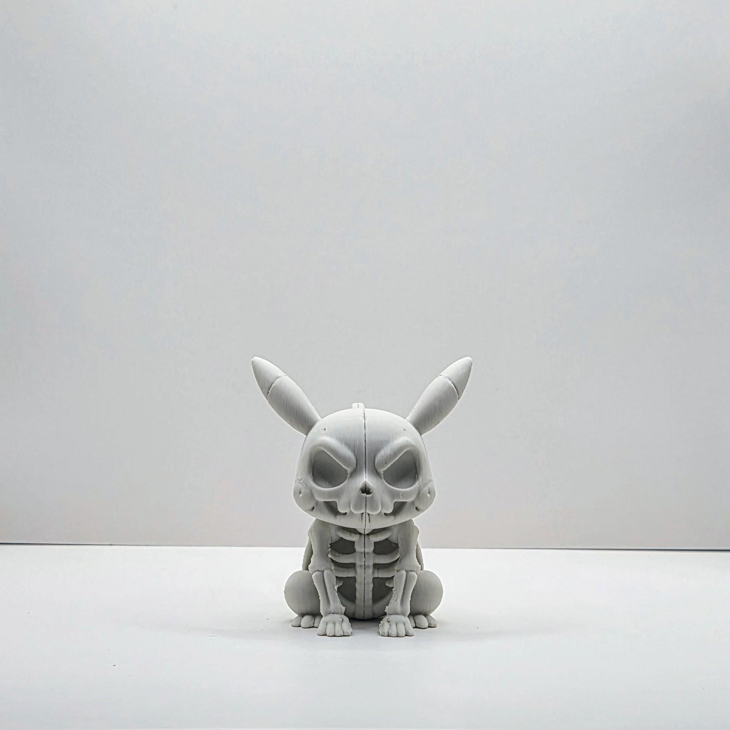 Skeletal Electric Rodent-Inspired Figure – Bone Detail Collectible