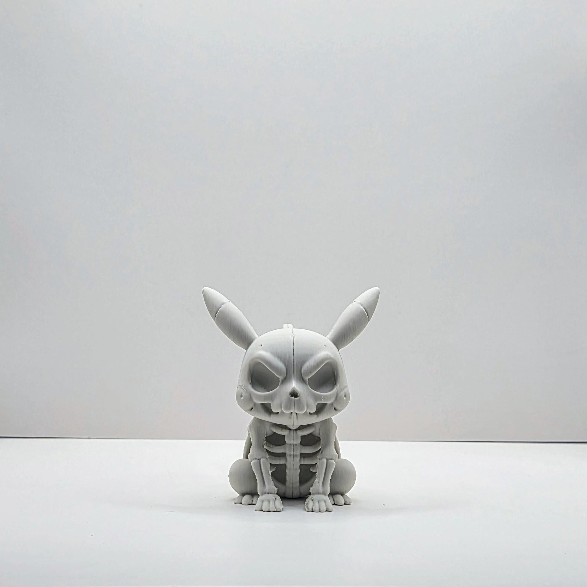 Skeletal Electric Rodent-Inspired Figure – Bone Detail Collectible