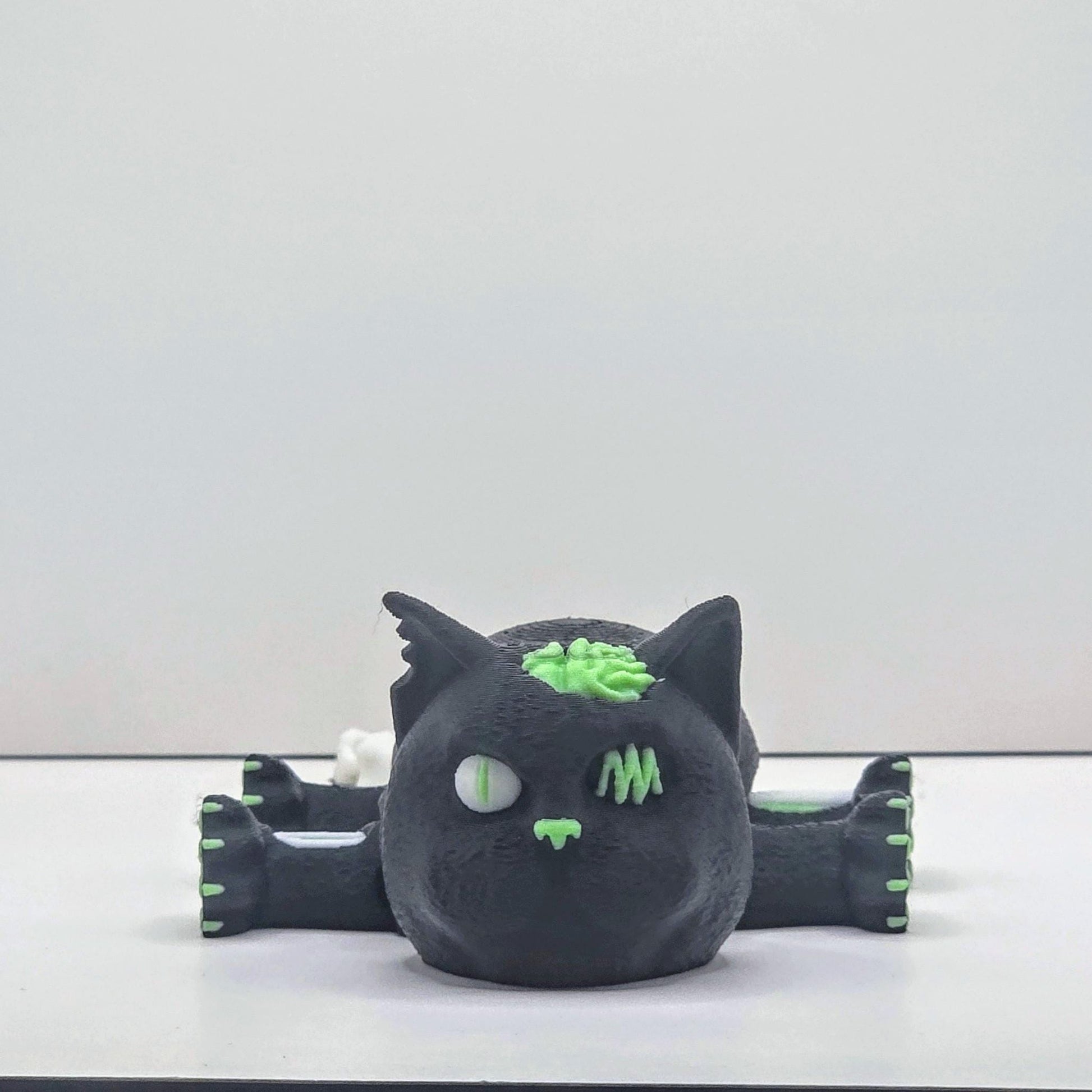 Zombie Cat Figurine – Glow-in-the-Dark Undead Kitty