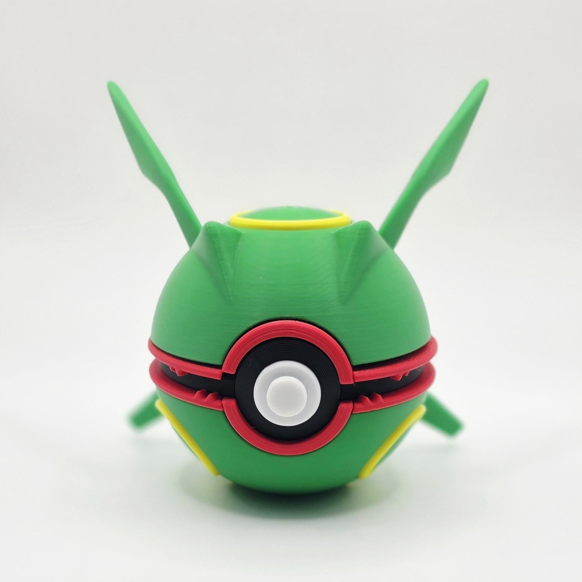 3D printed emerald sky serpent dragon creature ball with jagged wing detail