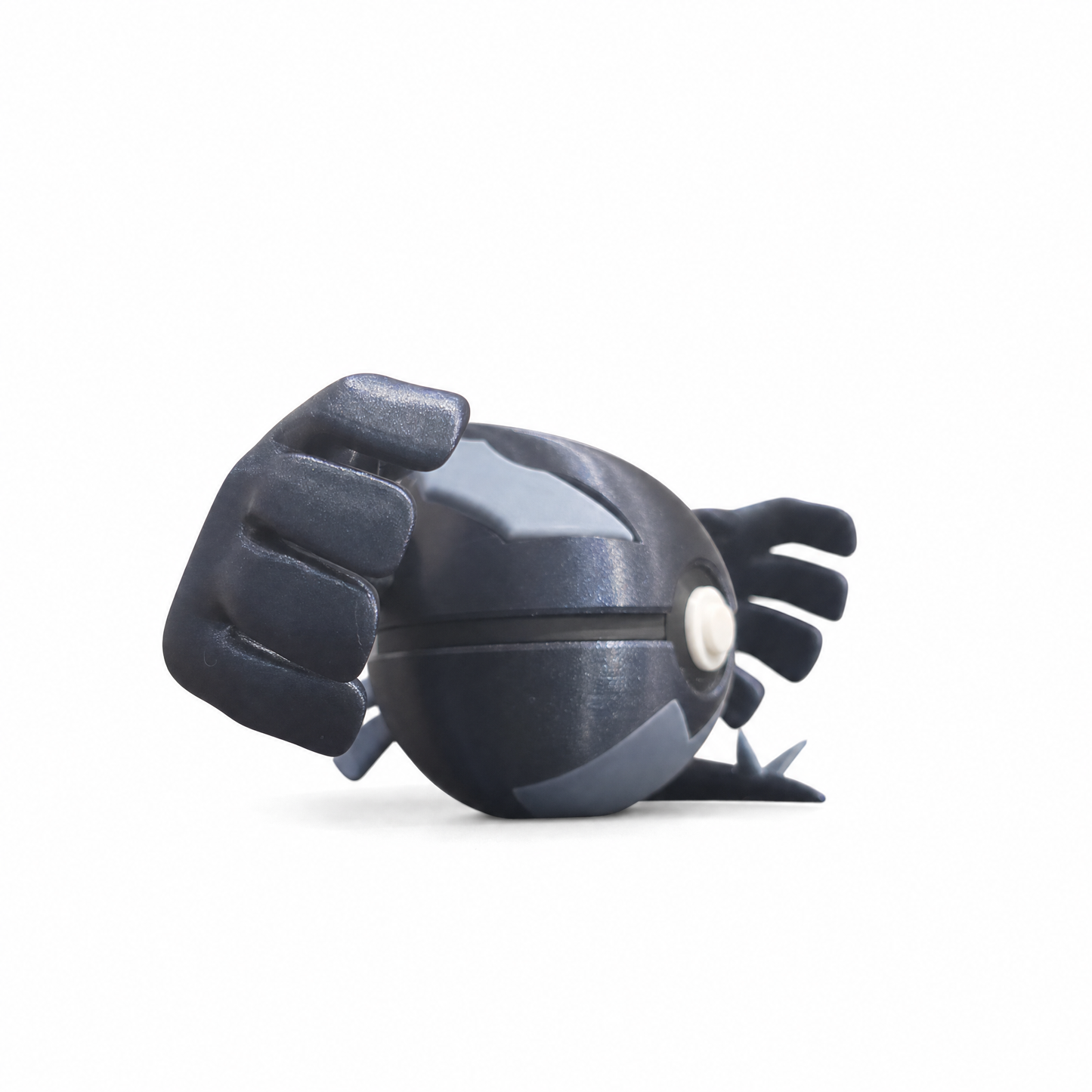 Close up of the shadow creature ball showing dark charcoal body and grey wing detail