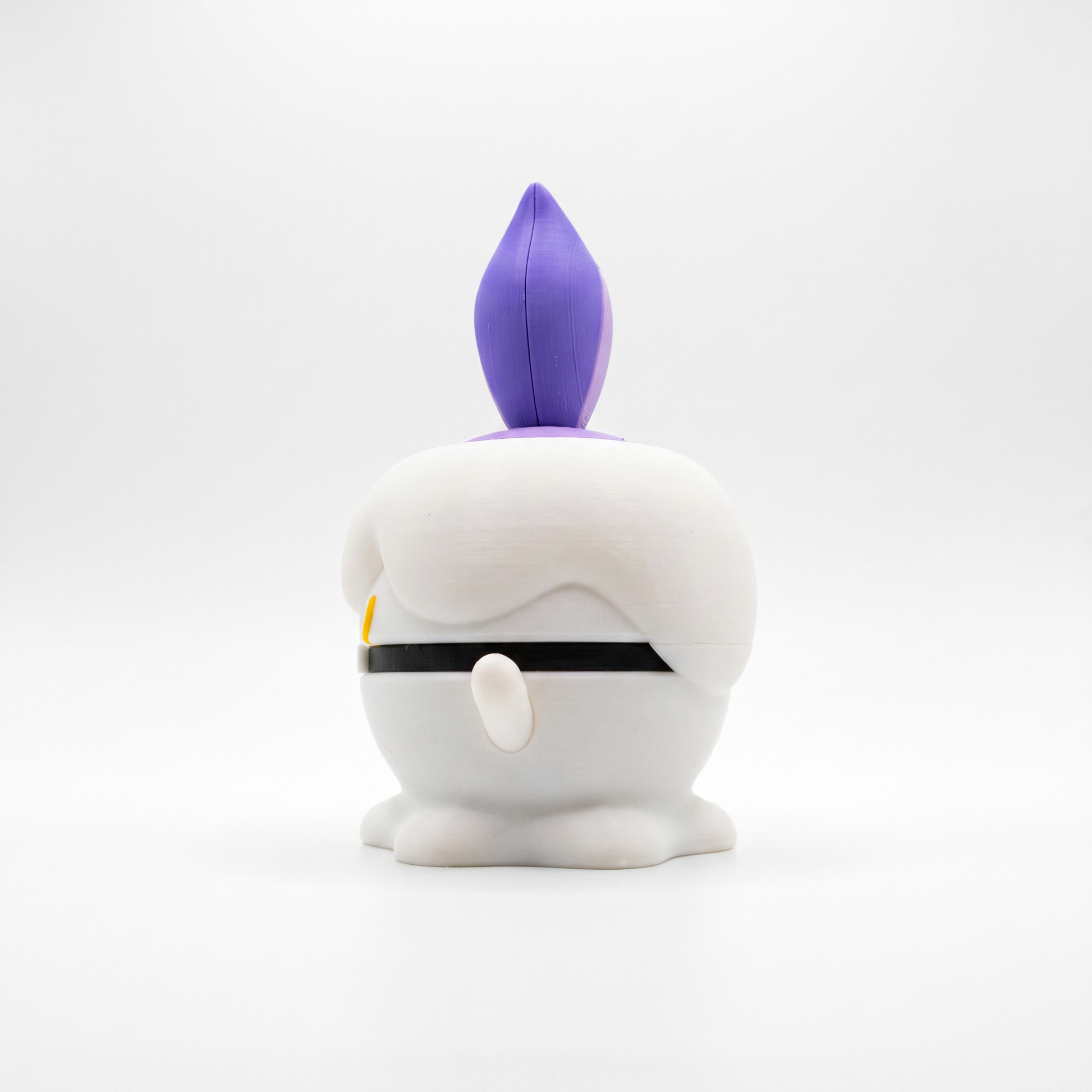 Close up of the creature ball showing single yellow eye and full ghost candle silhouette profile