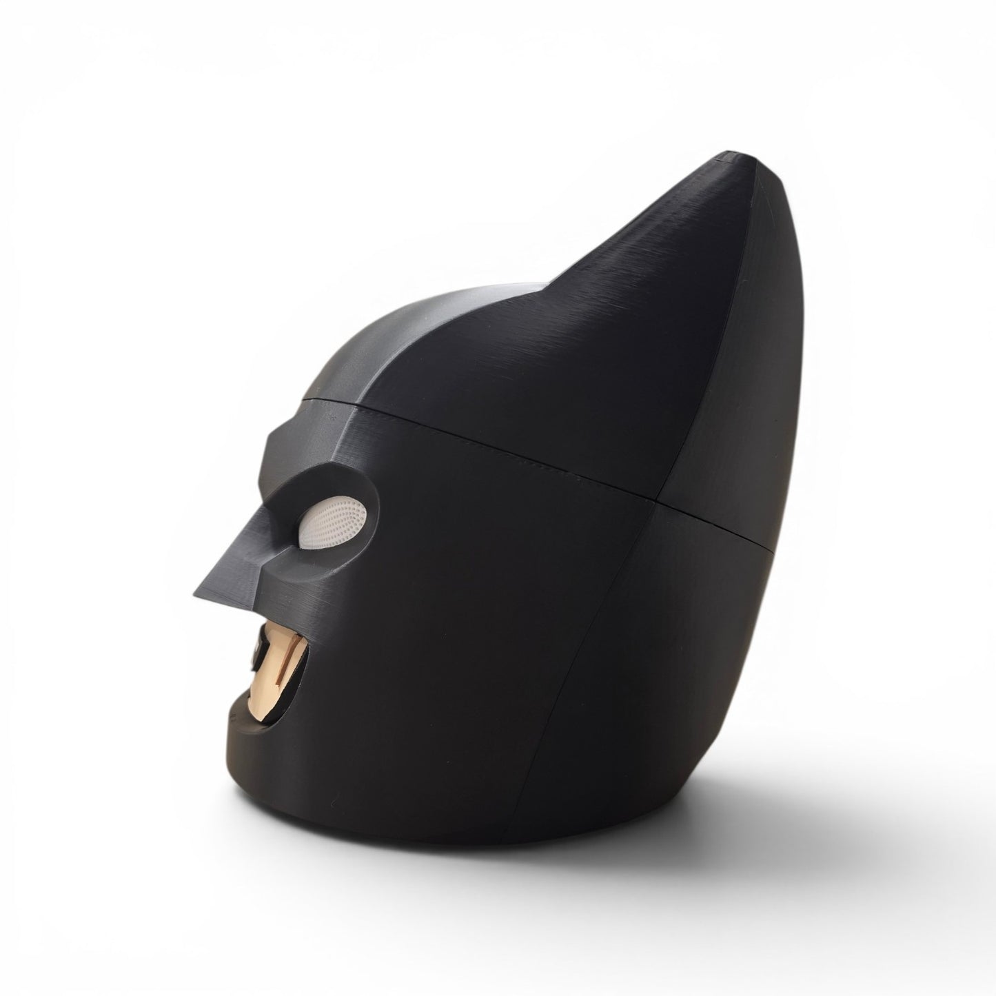 Close up of the block figure helmet showing gold chin detail and interchangeable mouth panel