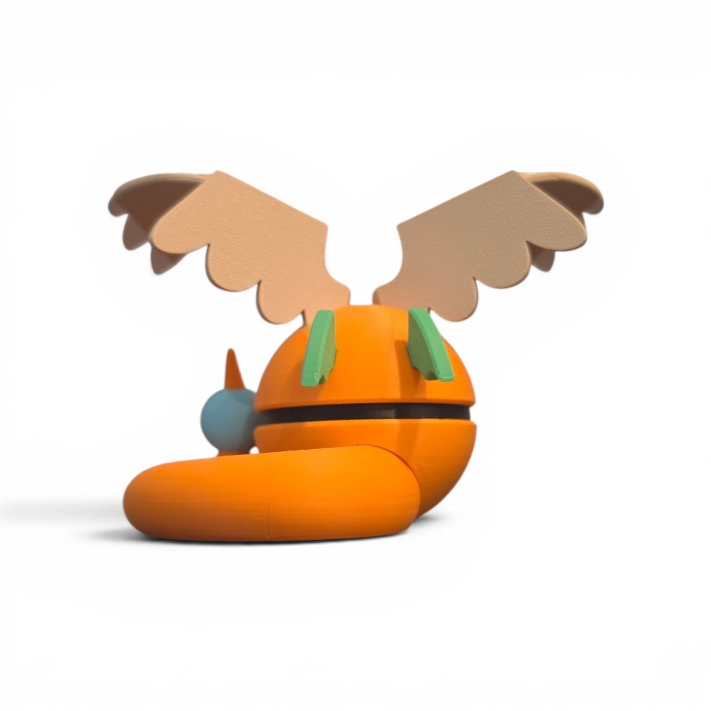 Close up of the creature ball showing light blue tail pearl orb and orange lower body detail