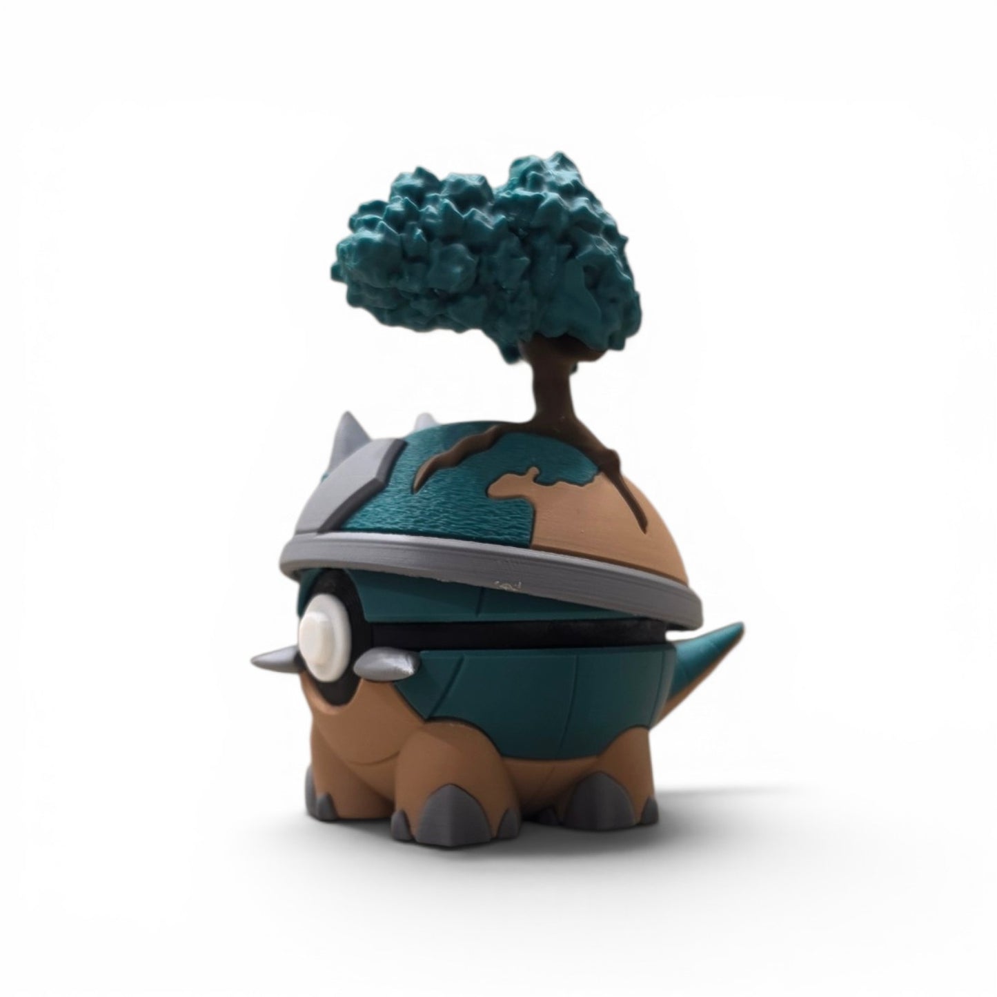 Close up of the creature ball showing oak tree trunk and tufted canopy detail on top