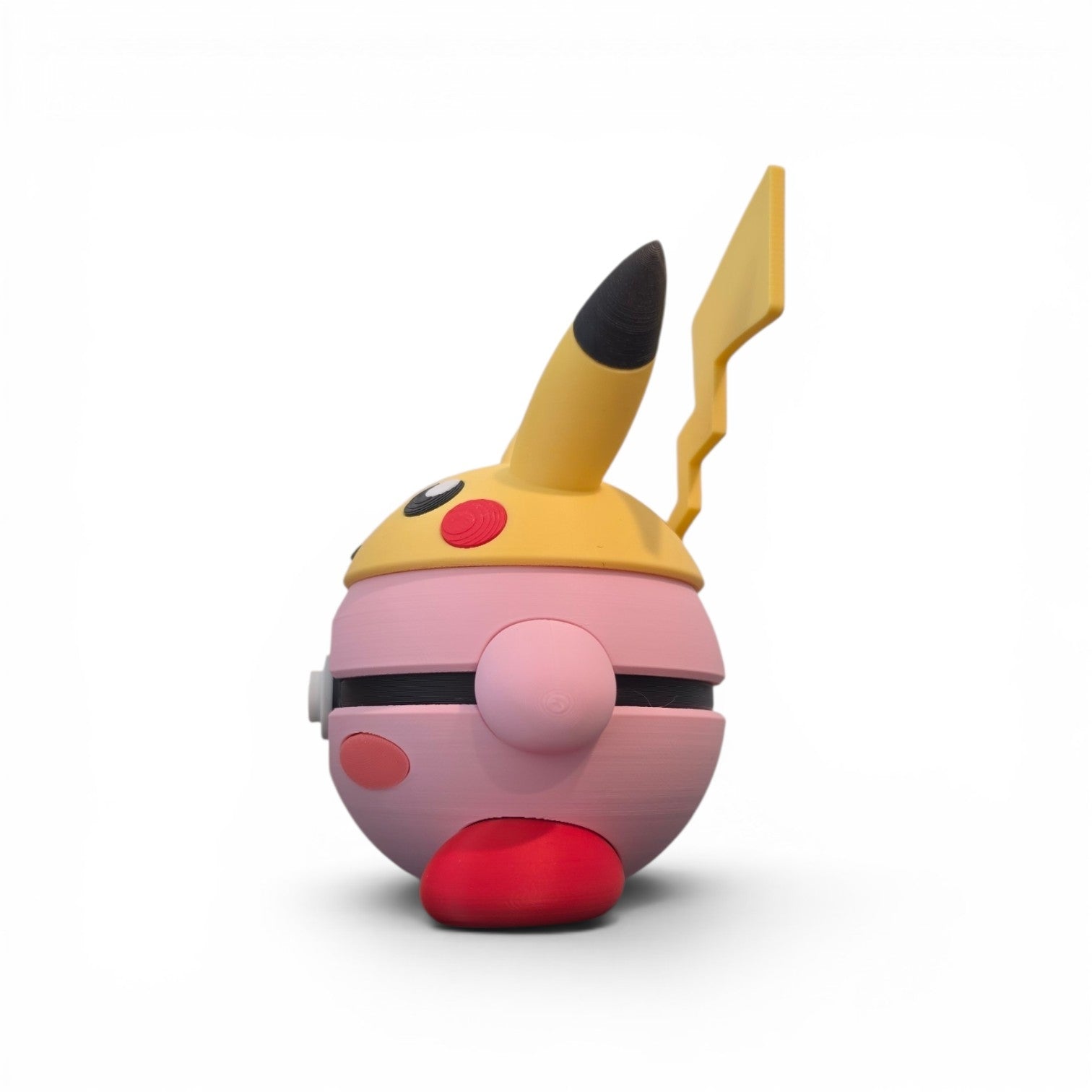 Close up of the creature ball showing stubby red feet and full profile side view