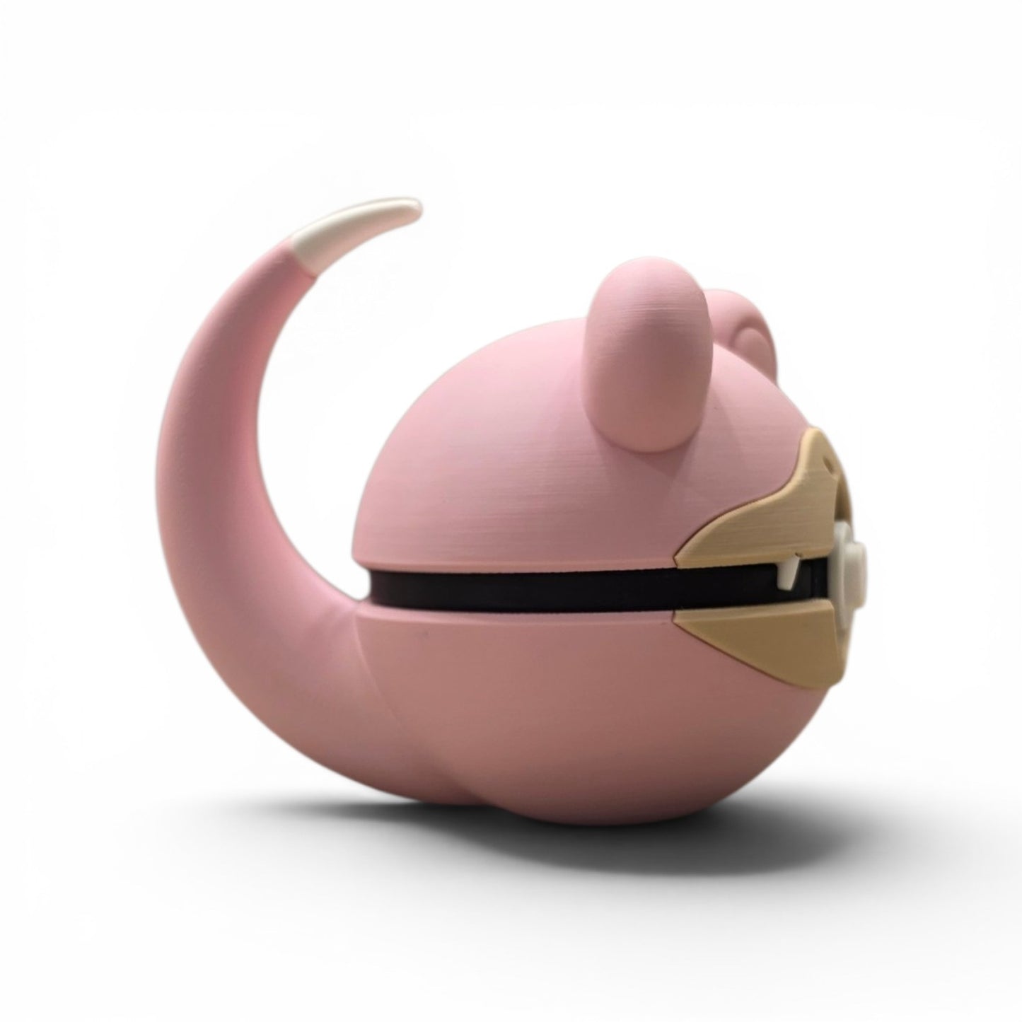 Close up of the creature ball showing stubby limbs and long tapering tail with pale tip