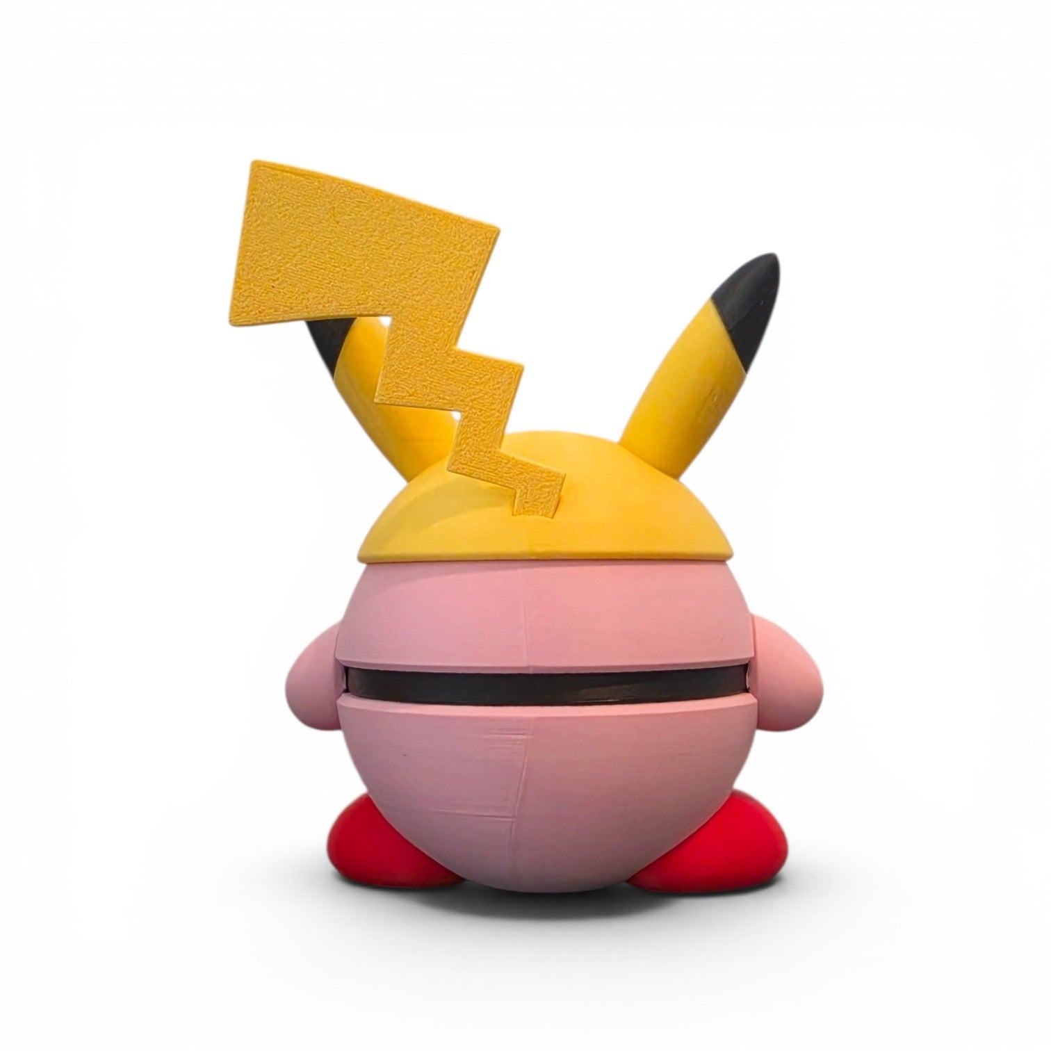 Close up of the creature ball showing rosy pink cheek circles and round pink body detail