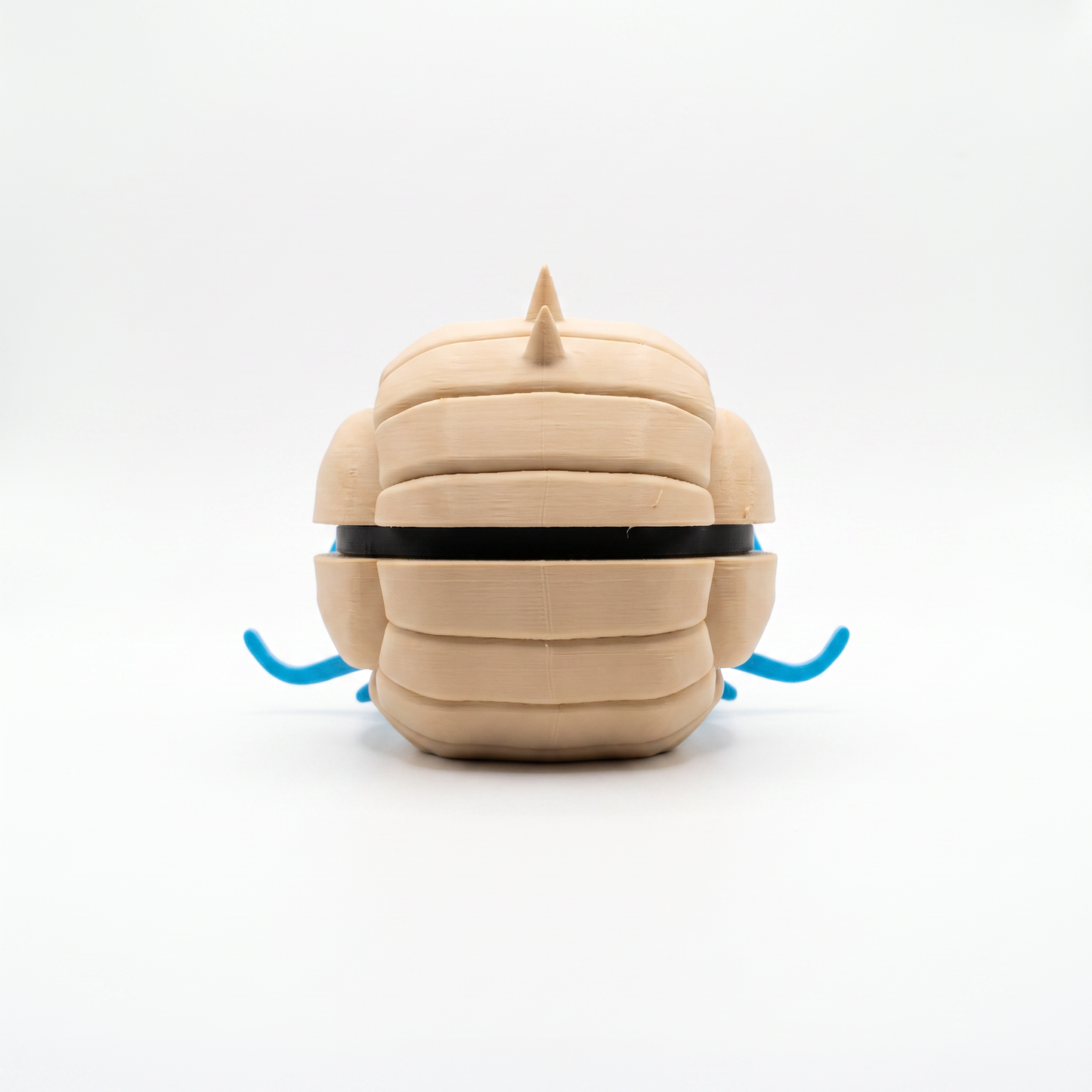 Close up of the spiky shell creature ball showing full side profile with spike crown and blue tentacles