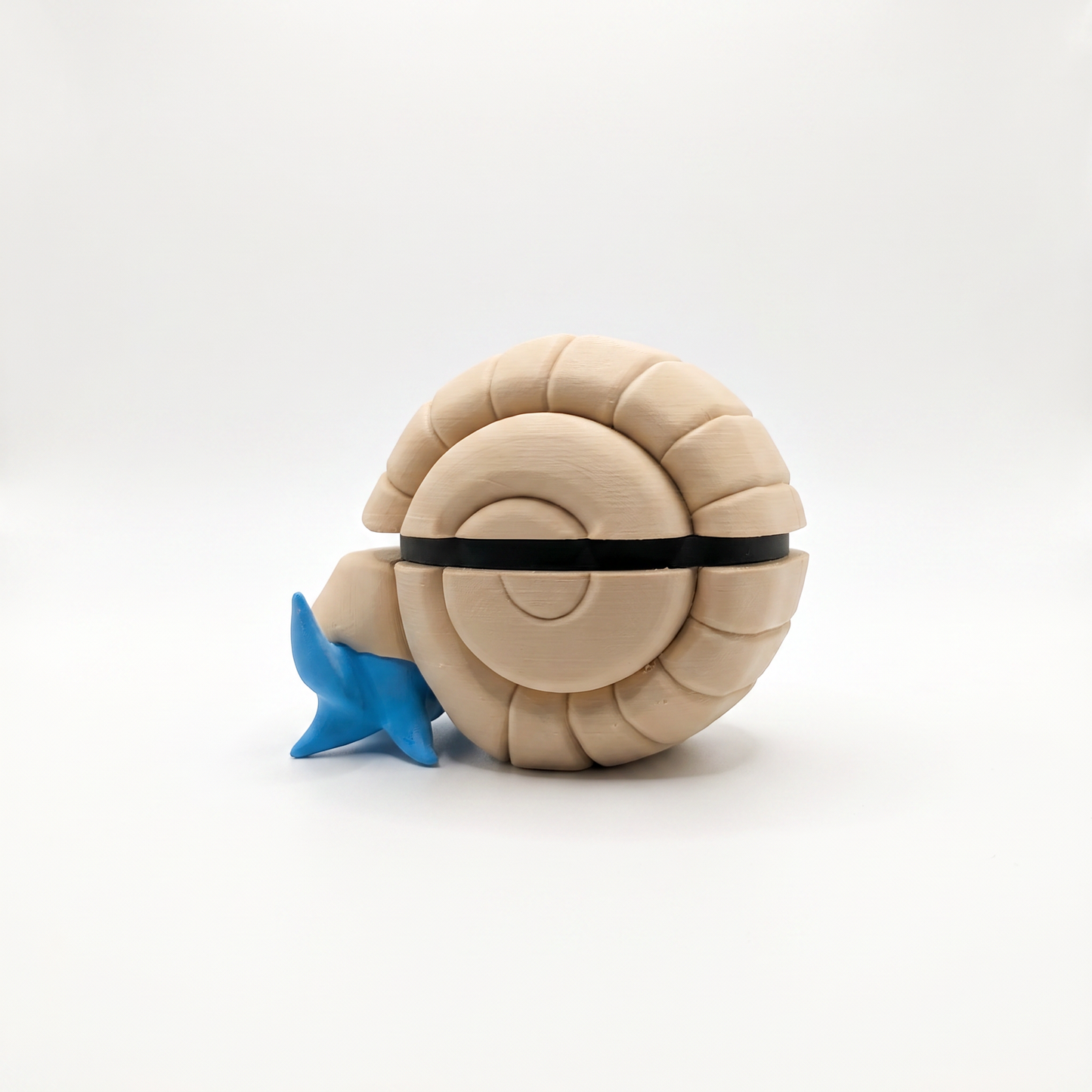 3D printed spiky shell evolved fossil creature ball with spiked crown shell and fanged beak front view