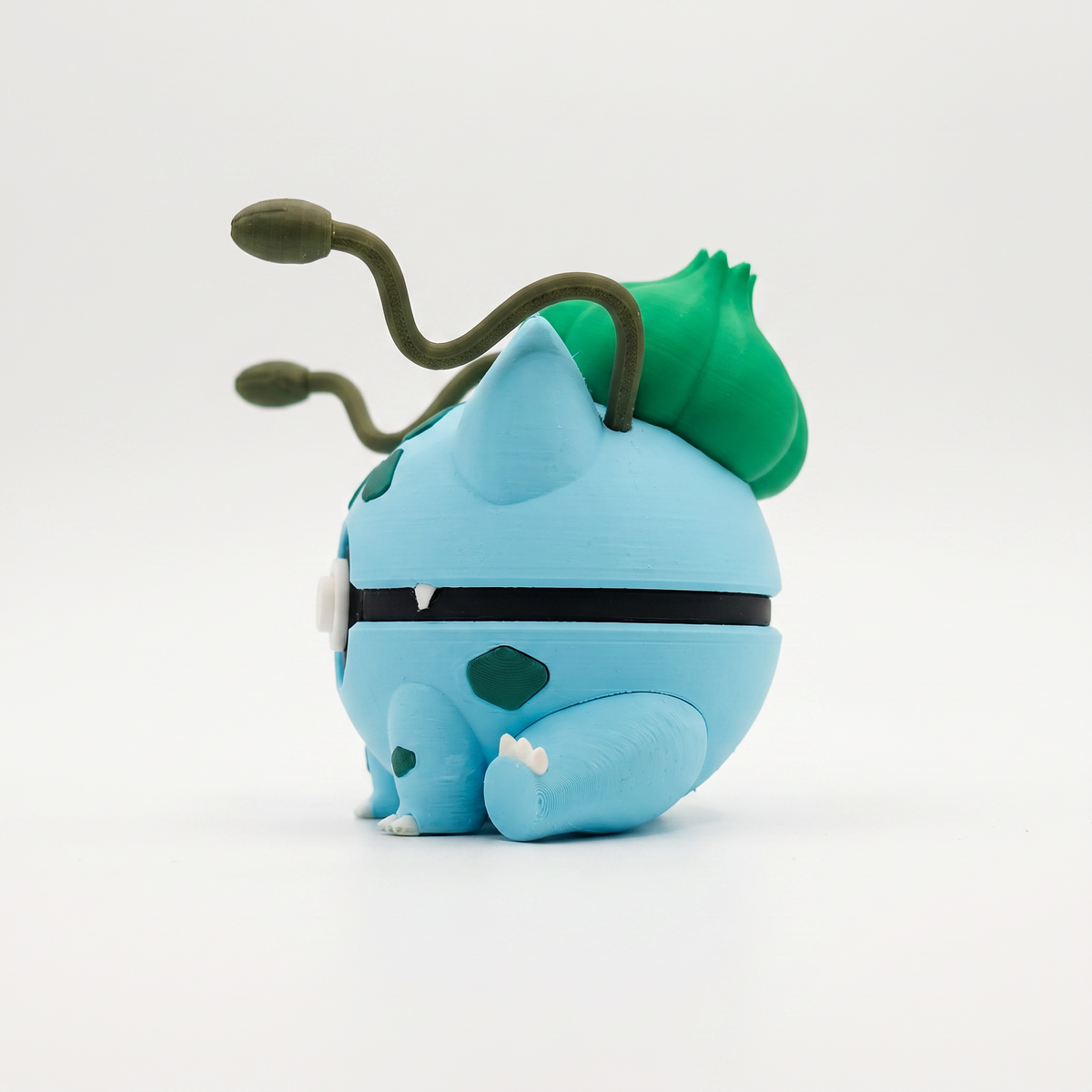 Grass starter blooming bulb creature ball collector figure detail view