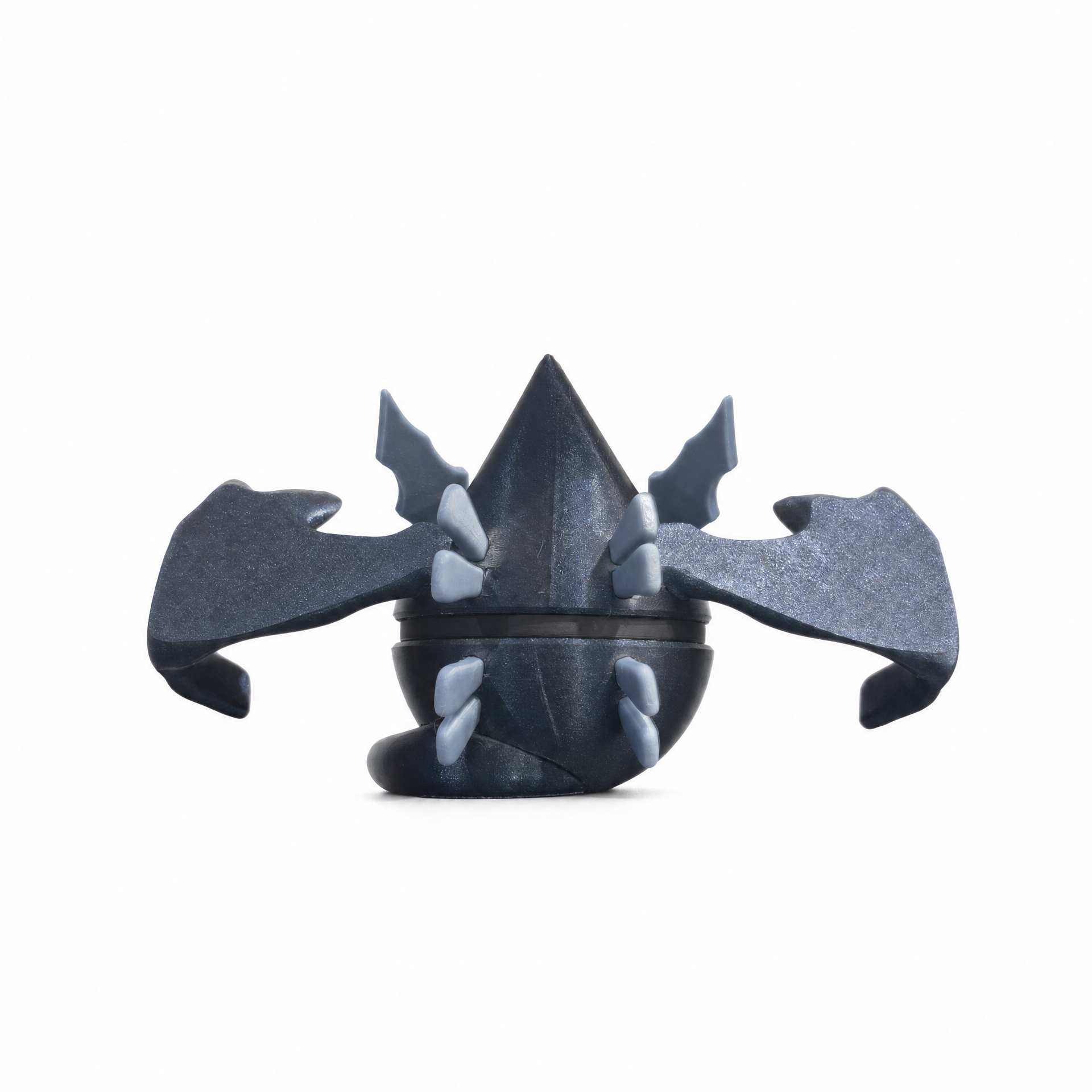 Close up of the shadow creature ball showing black wing claws and grey talon feet detail
