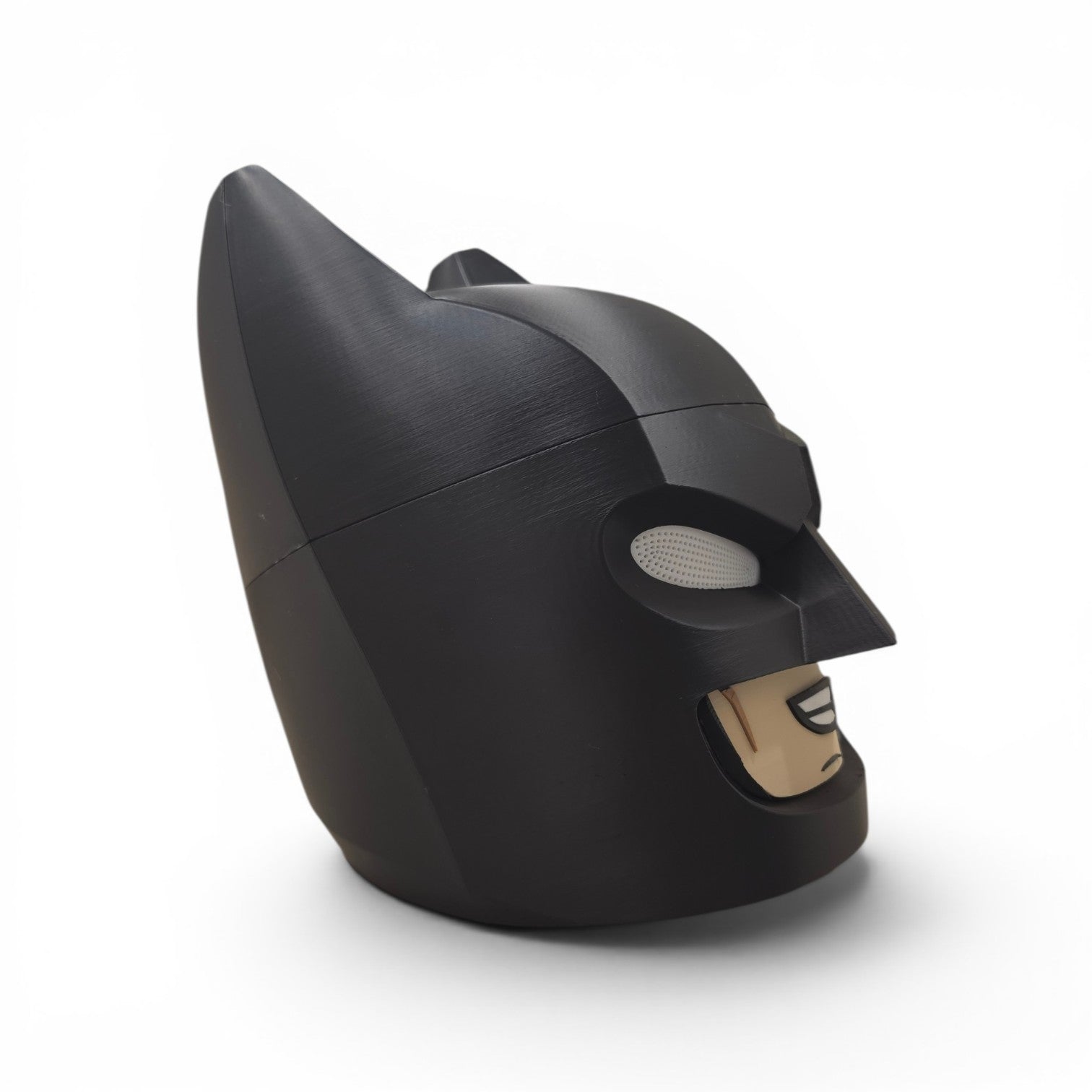 Close up of the block figure helmet showing angular bat ear silhouette and matte black finish