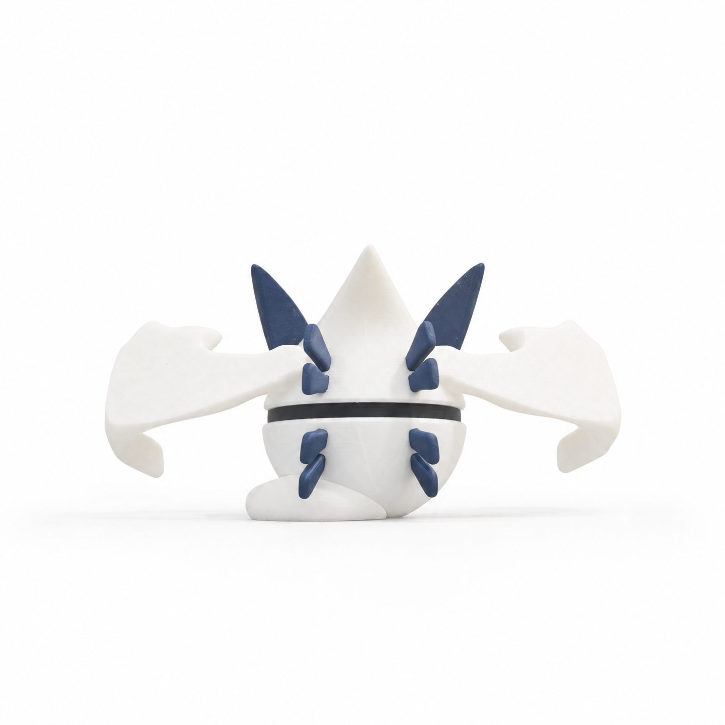 Close up of the silver guardian creature ball showing white wing claw detail spread wide
