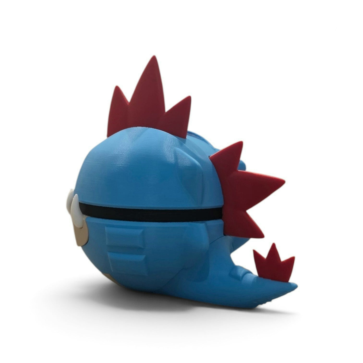 Blue crocodilian fang spike water type creature ball collector figure detail view