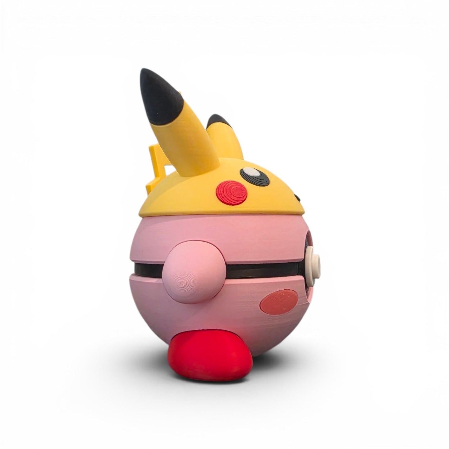 Close up of the creature ball showing yellow electric mouse hat with black tipped ears on pink puff body