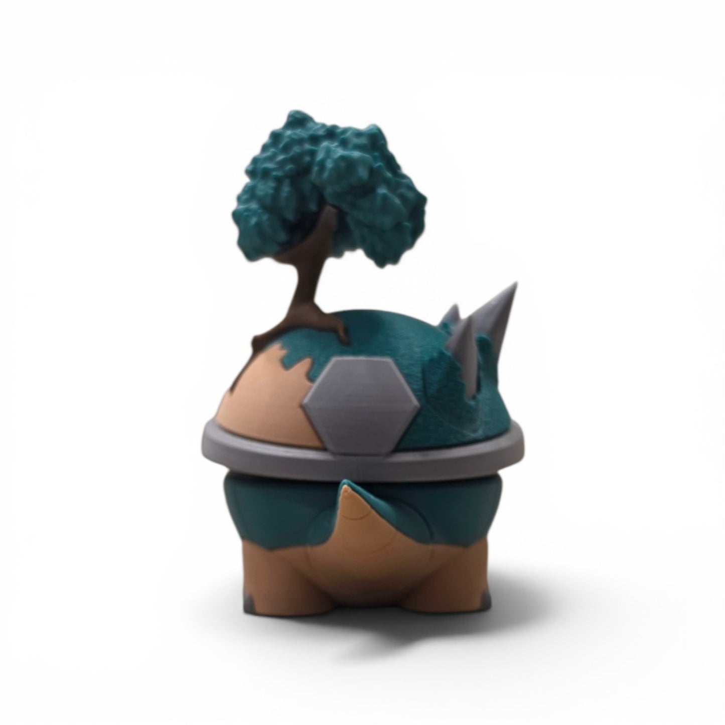 Close up of the creature ball showing three jagged stone mountain peaks and grey diamond rim